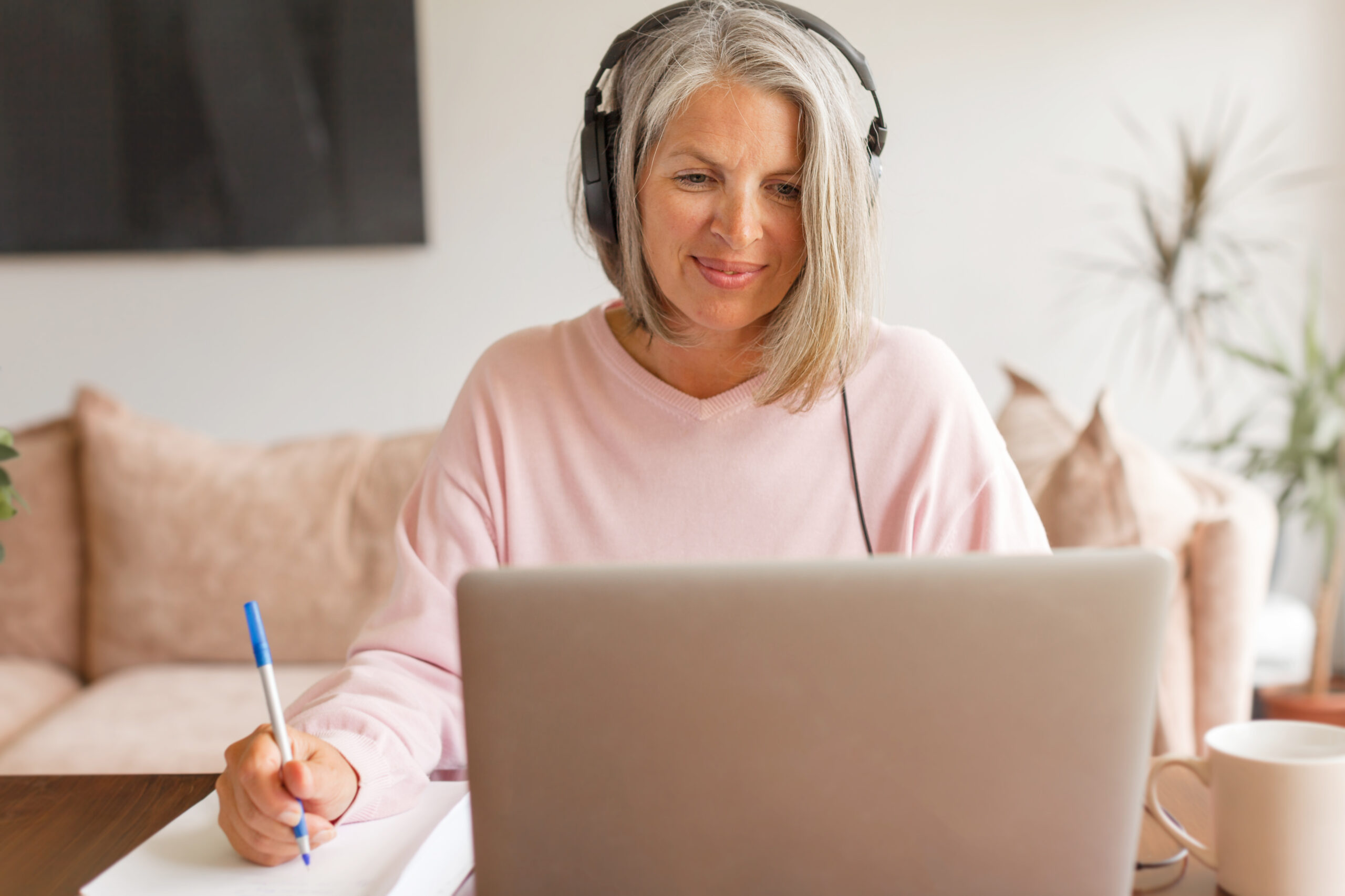 life long learning woman at laptop